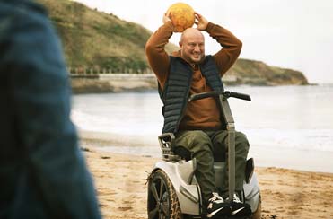 kmt-man-in-wheel-chair.jpg